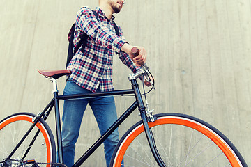 Image showing hipster man with fixed gear bike and backpack