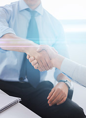 Image showing businessmen shaking hands in office