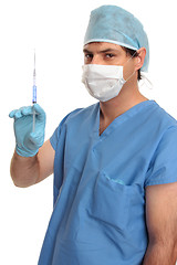Image showing Surgeon with vaccine or drug in syringe