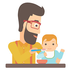 Image showing Man feeding baby.