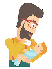 Image showing Man feeding baby.