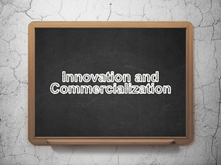 Image showing Science concept: Innovation And Commercialization on chalkboard background