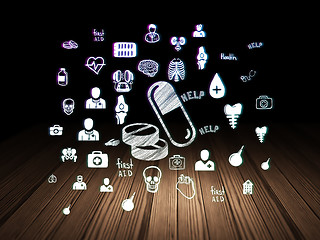 Image showing Medicine concept: Pills in grunge dark room