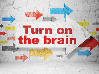 Image showing Learning concept: arrow with Turn On The Brain on grunge wall background