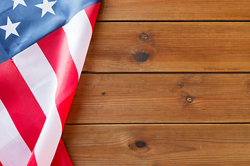 Image showing close up of american flag on wooden boards