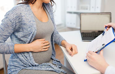 Image showing close up of doctor and pregnant woman at hospital