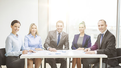 Image showing smiling business team at meeting