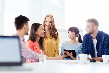 Image showing happy creative team or students working at office