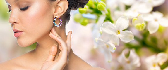 Image showing close up of beautiful woman face with earring