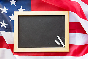 Image showing close up of school blackboard on american flag