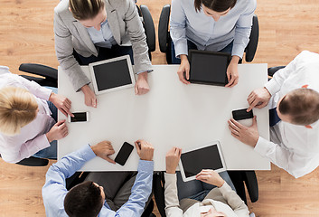 Image showing business team with smartphones and tablet pc
