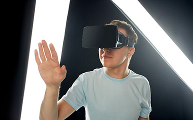 Image showing happy man in virtual reality headset or 3d glasses