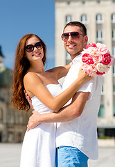 Image showing smiling couple in city