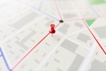 Image showing close up of map or city plan with pin