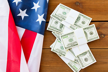 Image showing close up of american flag and dollar cash money