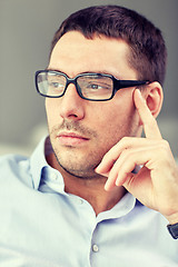 Image showing portrait of  businessman in eyeglasses at office