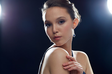 Image showing beautiful young asian woman with earring