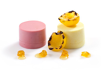 Image showing portion of two various dessert creams 