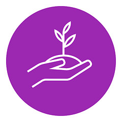 Image showing Hands holding seedling in soil line icon.