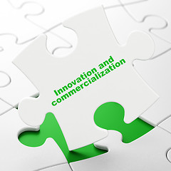 Image showing Science concept: Innovation And Commercialization on puzzle background