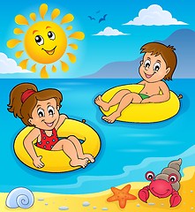 Image showing Children in swim rings image 2