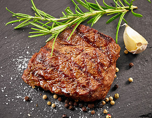 Image showing grilled steak with herbs and spices