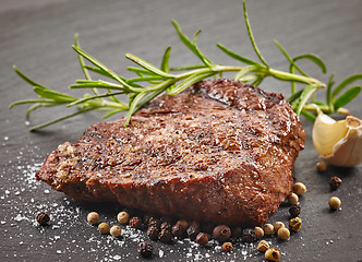 Image showing grilled steak with herbs and spices