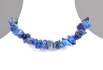 Image showing Splintered lapis lazuli chain on bust