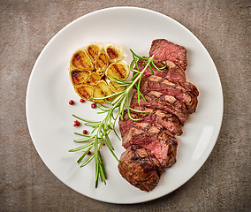 Image showing grilled steak on white plate