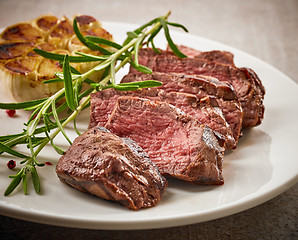 Image showing grilled steak on white plate