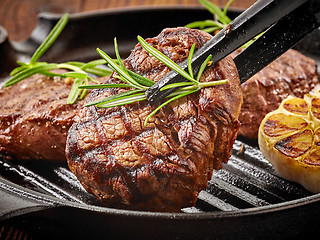 Image showing beef steak on cooking pan