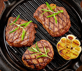 Image showing beef steak on cooking pan