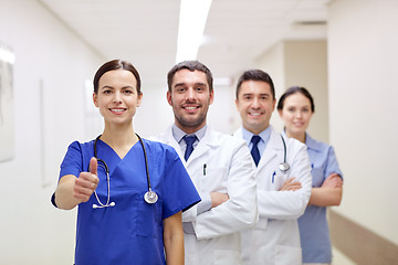 Image showing medics or doctors at hospital showing thumbs up