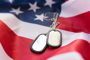 Image showing close up of american flag and military badges