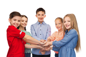 Image showing happy children with hands on top