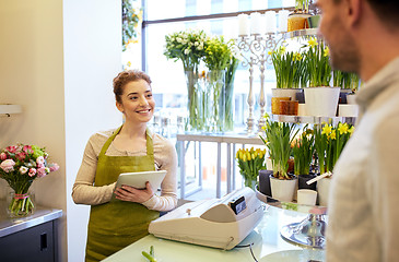 Image showing florist woman and man making order at flower shop