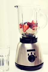 Image showing close up of blender shaker with fruits and berries