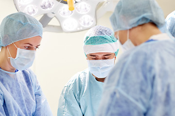 Image showing group of surgeons in operating room at hospital