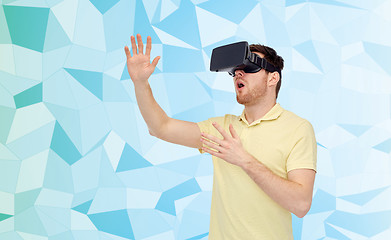 Image showing young man in virtual reality headset or 3d glasses