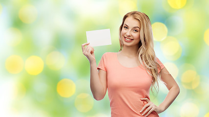 Image showing happy woman or teen girl with blank white paper