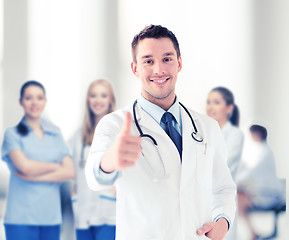 Image showing doctor with stethoscope showing thumbs up