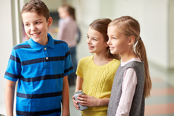 Image showing group of smiling school kids talking in corridor