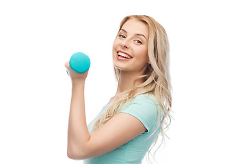 Image showing smiling beautiful young sporty woman with dumbbell