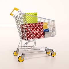 Image showing Shopping cart full of purchases in packages