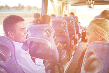 Image showing group of happy passengers in travel bus