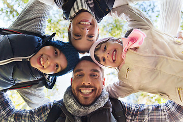 Image showing happy family faces outdoors at camp in woods