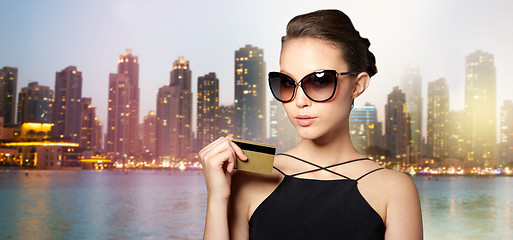 Image showing beautiful young woman in elegant black sunglasses