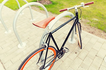 Image showing close up of fixed gear bicycle at street parking