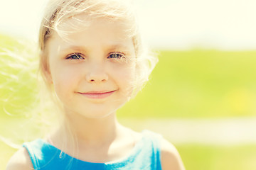 Image showing happy little girl outdoors at summer