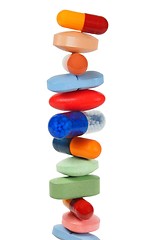Image showing Stacked pills on white